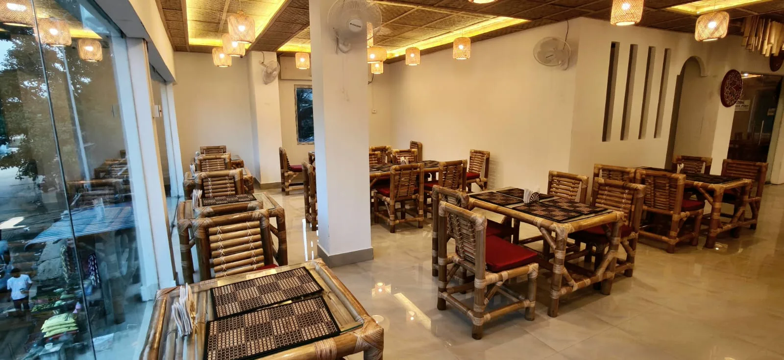 Long dining hall along the glass wall
